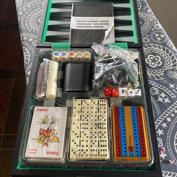 Complete with case chess,backgammon dominos, cribbage checkers poker set